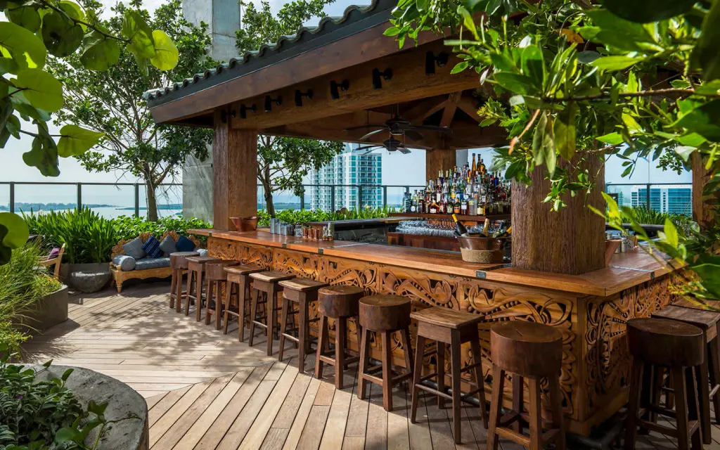 Elivar Rooftop Bar at night with Miami Skyline in backgorund